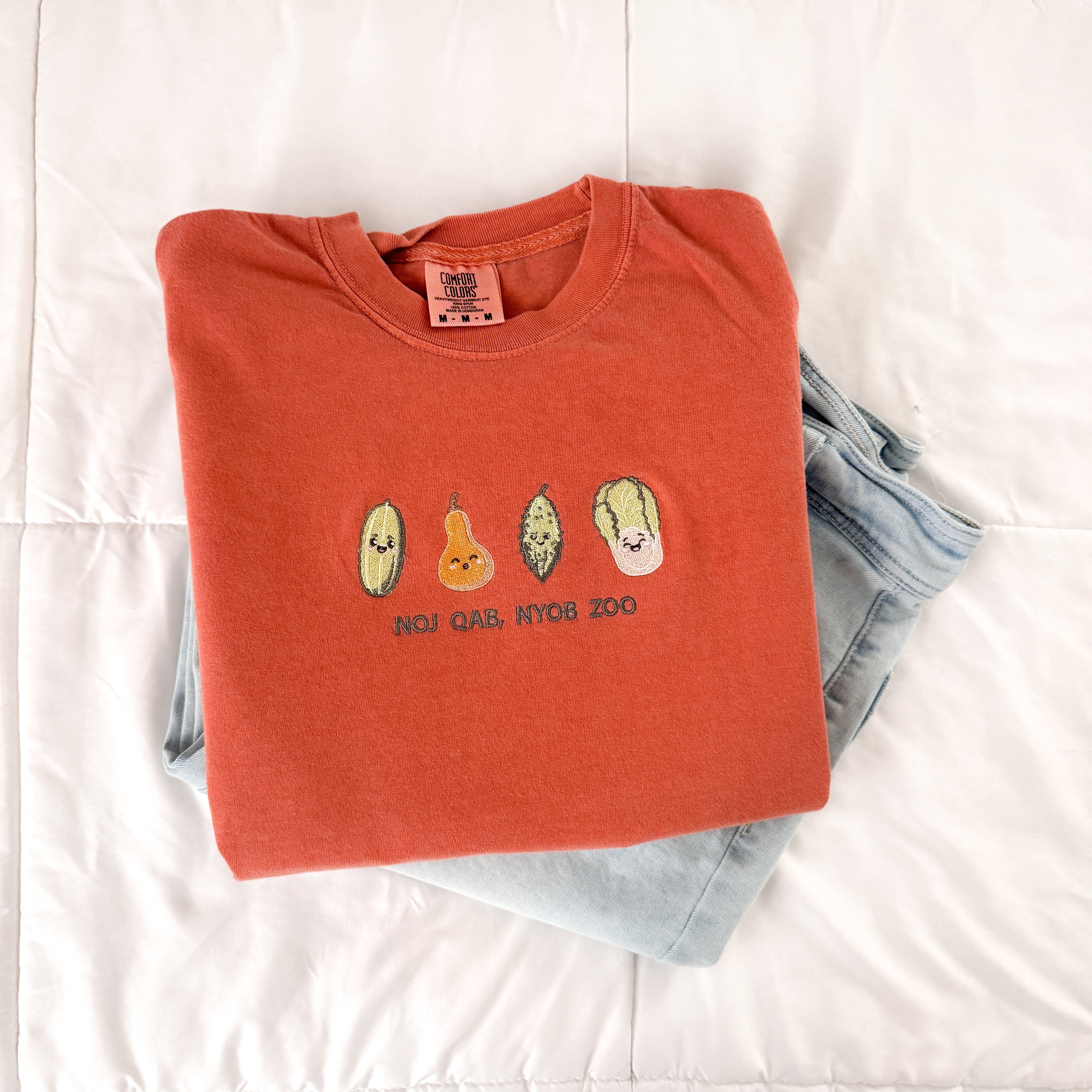 Noj Qab/Qaab, Nyob Zoo Tee